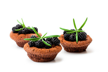 Homemade  chocolate brownies with berries isolated in white