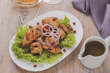  grilled meat pieces kebab chicken fillet sauce and salad barbecue