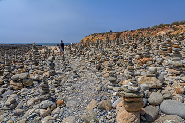 Stone towers on a beach at Vila Nova de Milfontes, Portugal