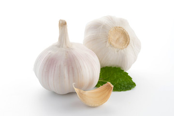 garlic with leaves of green mint isolated