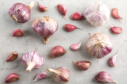 Fresh garlic on grey background