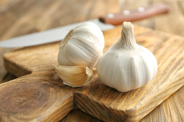 Fresh garlic on wooden board