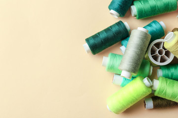 Set of sewing threads on light background