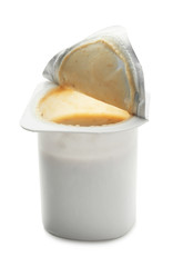 Plastic cup with yogurt on white background