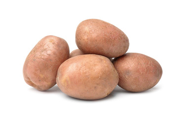 Fresh raw potatoes on white background