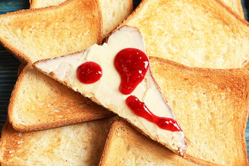 Tasty toasted bread with jam, closeup
