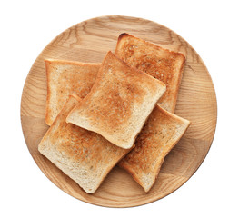 Plate with toasted bread on white background