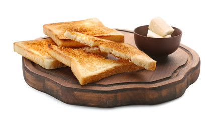 Wooden board with toasted bread and butter on white background