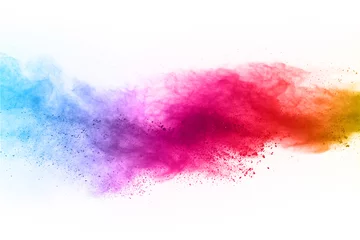 Foto auf Acrylglas Launched colorful dust, isolated on white background. © kitsana