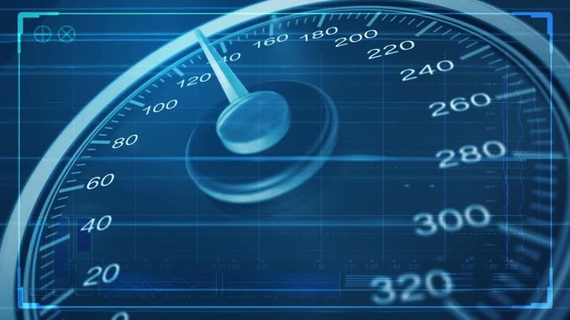 A macro closeup pan of a regular speedometer with glowing markings and a needle accelerating towards a high speed overlaid with a technical analysis data interface