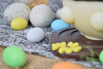 chocolate egg in the shape of a lamb with various decorations