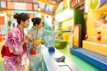attractive female traveler playing frisbee game