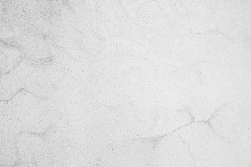 White cement texture plastered stucco wall painted fade background.