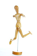 Wooden mannequin drawing model human shape. Doll body figurine statue pose posing to illustrate human body positures for draw class or every concept.