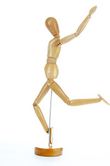 Wooden mannequin drawing model human shape. Doll body figurine statue pose posing to illustrate human body positures for draw class or every concept.