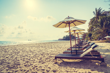 Umbrella and chair on the beach and sea