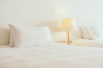 White pillow on the bed