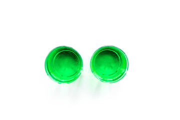 Absinthe shots on white background top view copy space
