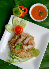 Fried rice on banana leaf background