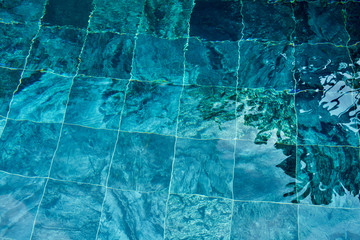 Colored water swimming pool background 