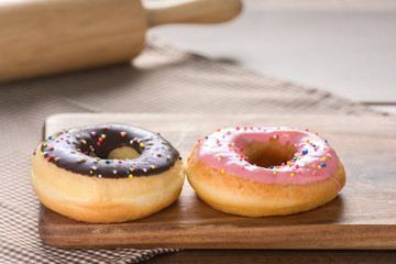 Donuts on Wooden Table.