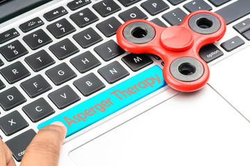 Fidget spinner with autistic therapy concept