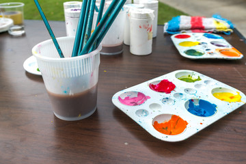 Paint and brushes with  close up view.