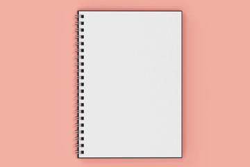 Opend notebook spiral bound on red background