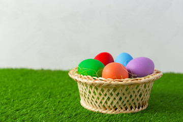 Naklejka na ściany i meble Easter eggs on the grass