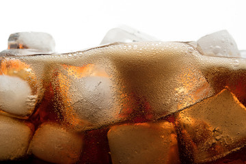 Cola soda with ice and bubble on front view white background cold drink beverage