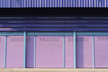 Purple roller shutter doors closed, Purple metal garage door