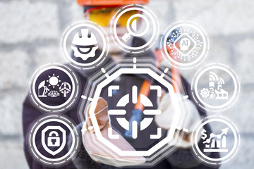 Industrial worker offers focus (purpose) icon on a virtual interface. Focus Development Industry 4.0. Target Modern Manufacture AI Information Technology Integrate concept.