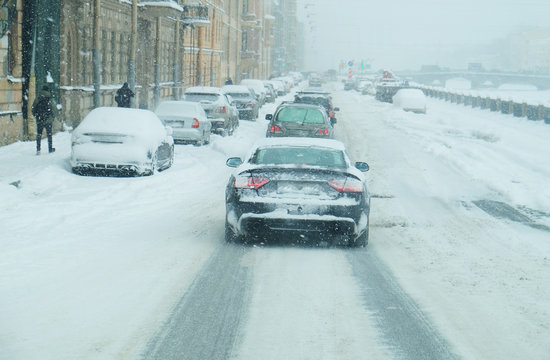 Snowfall On The Roads Of The Modern Big City