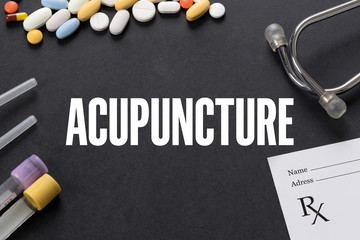 ACUPUNCTURE written on black background with medication