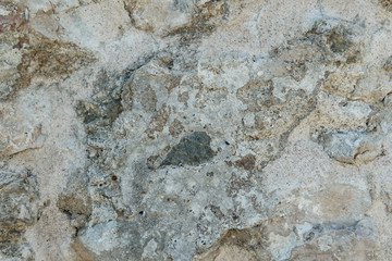 Granite texture, stone wall surface closeup