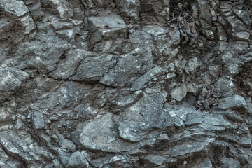 Aged gray stone macro, granite texture closeup