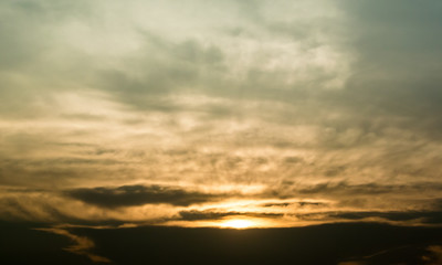 Fototapeta na wymiar Dramatic sky, Nice sun ray over clouds with sunset sky
