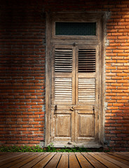 Brick wall with wooden door