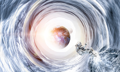Space hole and astronaut. Mixed media
