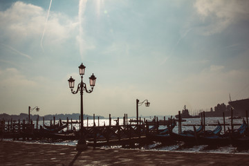 Silhouette of a street lamp in venice