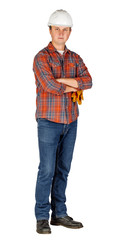 male builder in a helmet with crossed arms and looking at camera over white wall background. repair, construction, building, people and maintenance concept.
