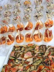Rolgordijnen buffet with rice pizza and ham with melon during the wedding reception © ChiccoDodiFC
