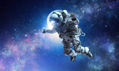 Fototapeta na wymiar Astronaut on space mission