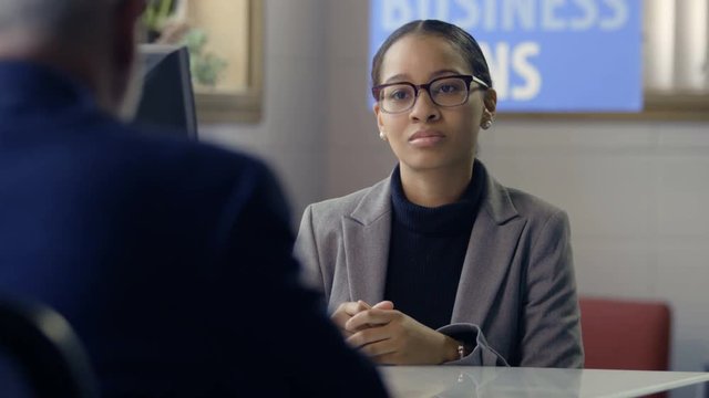 Black Female Banker Meeting With Client For A Business Loan