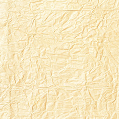 Crumpled yellow background paper texture
