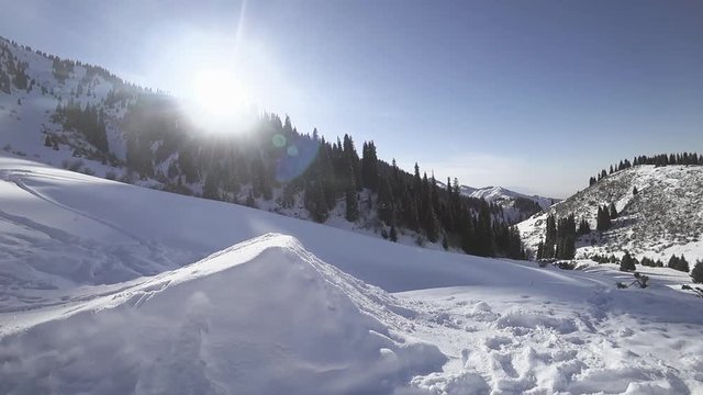 footage of Snowboarder doing high jump at mountain