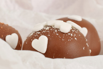 Pralines with heart shape confetties