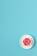 Coffee cup with colorful hearts