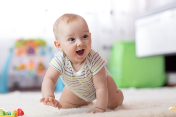 crawling funny baby boy indoors at home - obrazy, fototapety, plakaty