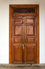 Old wooden brown house door